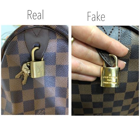 how to spot a fake louis vuitton lock and key|louis vuitton keychain wallet.